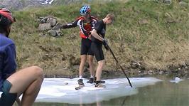 Tao joins Olly on the iceberg, but their combined weight is just too much for the iceberg, which promptly starts to sink